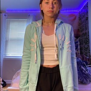 Light blue zip up sweatshirt